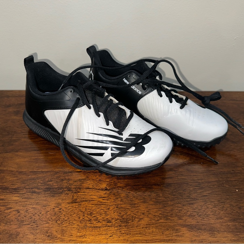 New Balance Women’s Black and White Athletic Turf Shoes